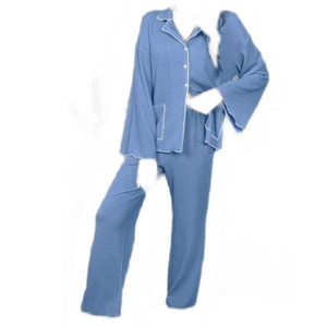 Women's pajama set featuring a button-down lapel shirt and pants in dusty blue crepe