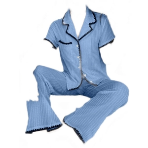 Short sleeve light blue pajama set with black scalloped trim and vertical ribbed texture