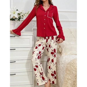 Women's floral pajama set with red ribbed long sleeves and matching floral trousers