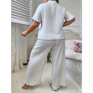 Women's plus size two-piece white pajamas set with short sleeves and ruffles