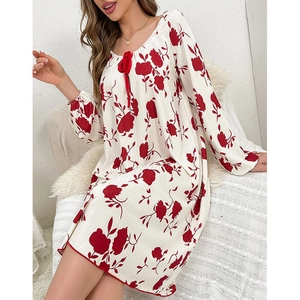 White long-sleeve nightdress with red floral print and lace-up round neck detail