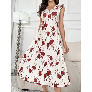 Detail of floral sleepwear dress showing ruffled shoulder straps and buttoned neckline