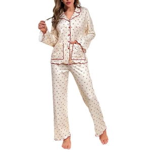 Women's cherry print pajamas set with long sleeves and pants in cream satin finish