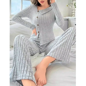 Elegant grey knit lounge set with long sleeves and wide-leg pants for cozy home wear
