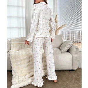 Floral pajama set for women featuring long-sleeve lapel top and ruffled hem pants
