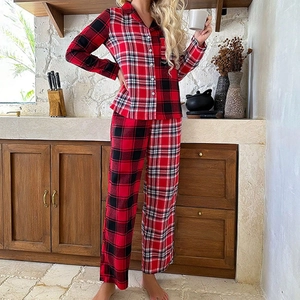 Women's plaid pajama set with red and black flannel button-down top and matching pants