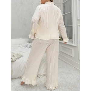 Women's cream white ribbed lounge set with ruffled edges and wide-leg pajamas pants