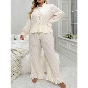 Beige ribbed pajama set with V-neck ruffle trim top and pants for cozy loungewear