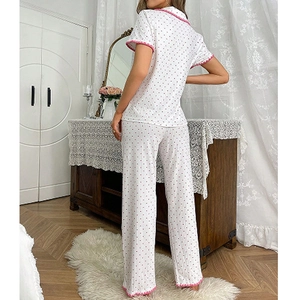 Women's summer pajama set with short sleeves, pants, pink polka dots and lace trim