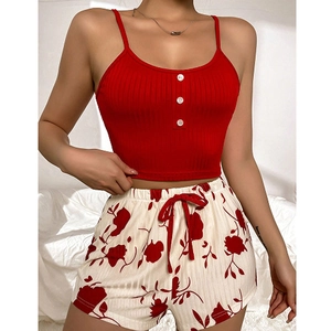 Women's summer pajama set with red ribbed tank top and floral print shorts