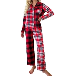 Women's autumn pajama set with red and black tartan pattern featuring a button-up lapel shirt