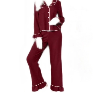 Elegant burgundy long-sleeved pajama set for women with ruffle cuffs and white piping trim