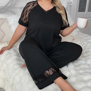 Women's black V-neck lace patchwork pajama set with short sleeves and wide-leg pants