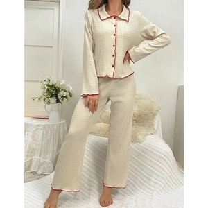 Women's chic lounge pajama set with long sleeves and red contrast piping detail