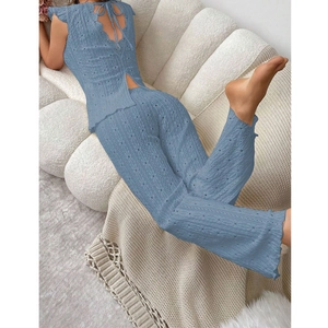 Light blue eyelet textured two-piece loungewear set with backless tie top and trousers