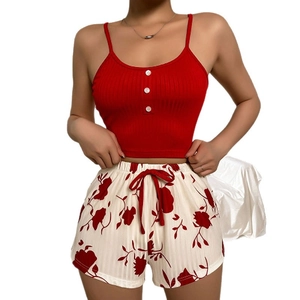 Women's summer pajama set with red ribbed camisole and floral shorts with drawstring