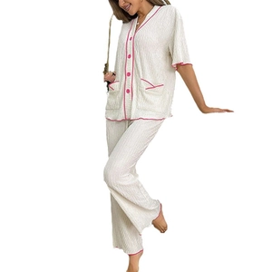 Women's V-neck short sleeve pajamas set with pants and pink contrast piping detail