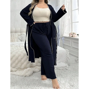 Three-piece navy waffle knit loungewear set with robe, camisole, and pants for women