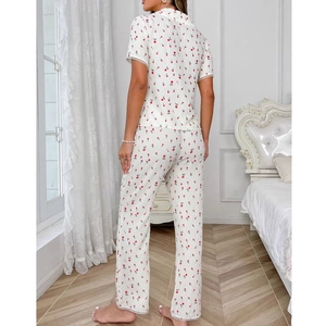 Women's pajama set featuring short sleeve lapel shirt and pants in cherry floral print