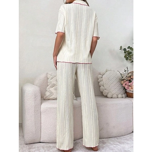 Women's pleated loungewear set with short sleeve top and pants in beige with pink piping