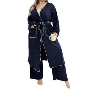 Three-piece navy blue women's loungewear set with waffle texture robe and wide trousers