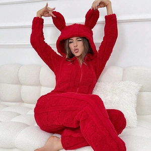 Women's red coral fleece hooded onesie with cute rabbit ears and front zipper closure
