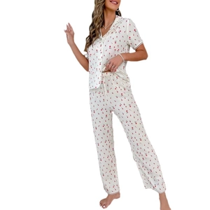 Women's pajama set featuring short sleeve lapel cardigan and long pants with cherry print