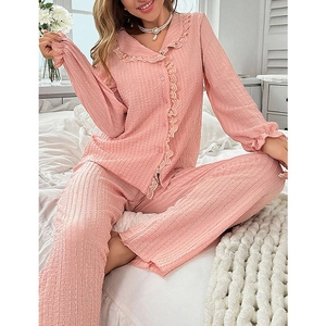 Pink seersucker pajama set with ruffled doll collar and long pants for home comfort