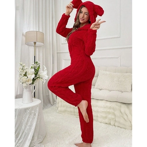 Detail of red cable-knit coral fleece onesie with plush hood and cute animal ears