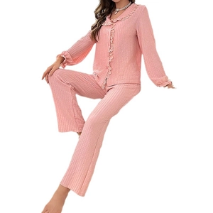 Pink waffle knit pajama set for women featuring doll collar and ruffle trim sleepwear