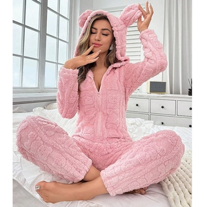 Pink sherpa one-piece hooded pajama with animal ears and textured circular fleece pattern