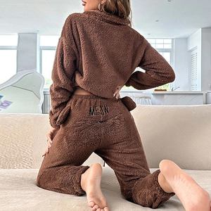 Women's brown fuzzy fleece two-piece pajama set with MEOW embroidery detail on pants