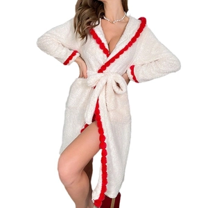 Cozy white hooded flannel bathrobe for women with festive red pompom trim detail