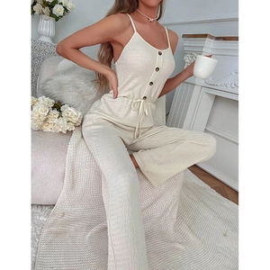 Beige ribbed loungewear set with button-front camisole and wide-leg drawstring pants