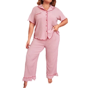 Pink short sleeve lapel pajama set for women with classic piping and ruffle hem pants