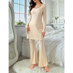 Women's apricot rib-knit loungewear set with long sleeve cross-neck top and flared pants