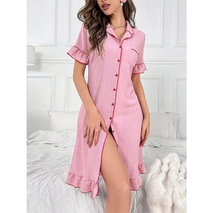 Women's pink short sleeve button-up nightgown with lapel collar and ruffle hem detail
