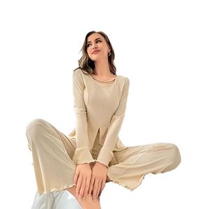 Women's champagne loungewear set with ribbed texture, crew neck top and wide-leg trousers