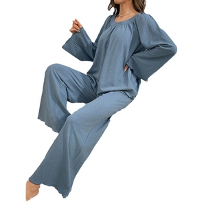 Women's blue waffle texture pajama set with long sleeve crewneck top and wide leg pants