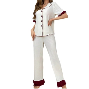 Women's ruffle trim short sleeve pajama set in cream with red contrast piping