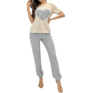 Women's striped pajama set featuring apricot love print top and grey ribbed trousers
