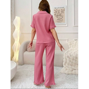 Pink ribbed short sleeve pajama set with lace trim and long pants for women