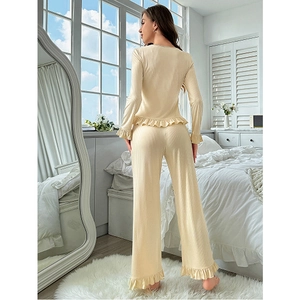 Women ruffle pajama set with long sleeve top and pants in soft cream ribbed fabric