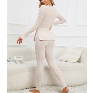 Women's cream ribbed thermal underwear set featuring long sleeves and side slit top