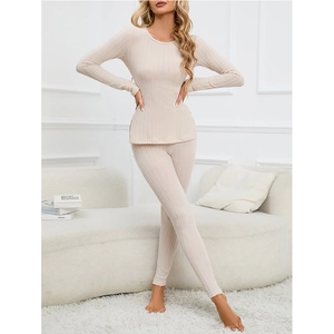 Women's cream thermal underwear set with ribbed knit long sleeves and slim-fit trousers