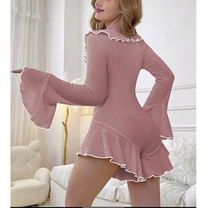 Pink ribbed knit long sleeve romper with ruffled edges and white trim for loungewear