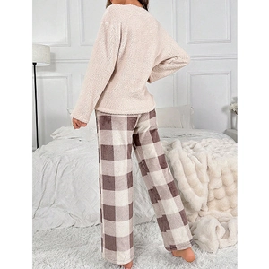 Rear view of cozy beige plush long sleeve top and brown plaid coral fleece trousers