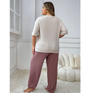 Women's two-piece ribbed loungewear set with short-sleeve top and loose joggers pants