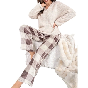Cozy two-piece coral fleece pajama set for women with V-neck top and plaid trousers
