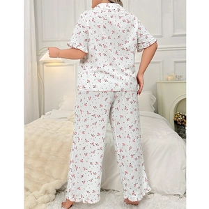 Women's floral short sleeve pajama set with ruffle trim and straight leg pants